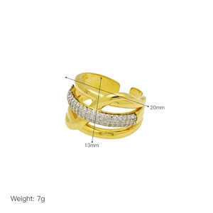 Detailed view of two-tone gold ring with zircon stones, showing 20mm x 13mm dimensions