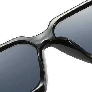 Classic square black sunglasses for women with deep gray UV protection lenses
