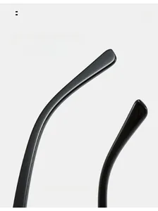 Detail view of glossy black curved temples on square sunglasses for comfortable wear