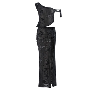 Detail of sheer black floral mesh fabric and lace texture on sexy two-piece skirt set