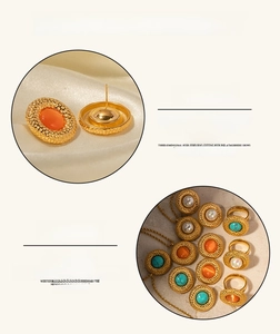 Detailed view of vintage 18k gold plated stainless steel jewelry with colorful stone inlays