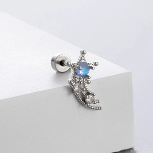 Silver celestial earring with light blue zircon heart design on white background