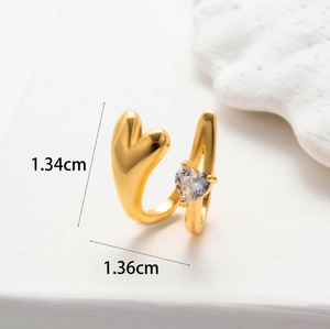 Detailed size chart of a gold butterfly ear cuff showing 1.34cm and 1.36cm dimensions