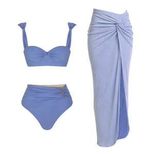 Detailed view of lilac blue three-piece swimsuit with cutout knots and wrap skirt detail