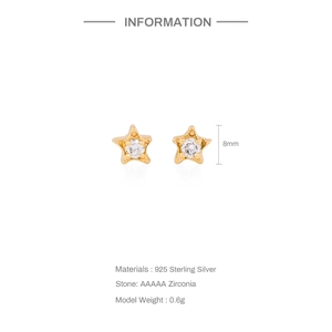 Detail view of 8mm gold S925 sterling silver star studs with AAAAA zirconia stones