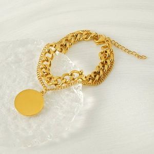 Double-layered gold-plated titanium steel bracelet featuring a round polished pendant charm