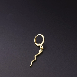 Golden snake drop earrings with green gemstone eyes and polished huggie hoop finish