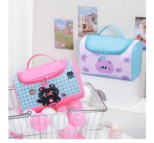Cute pink plaid cosmetic bag with handle showing waterproof fabric and sweet design