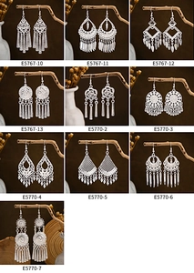 Collection of bohemian silver leaf fringe earrings shown in various ethnic tassel designs