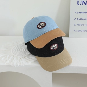 Contrast panel baseball cap for kids featuring circular letter embroidery in two colorways