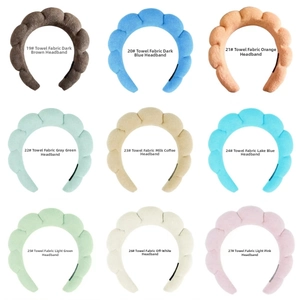Nine colors of thick bubble towel cloth sponge headbands in a organized grid layout