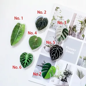 Tropical leaf patterned expanding cell phone socket stand for desk in green styles