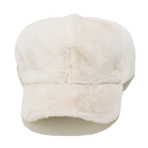 Close-up of soft cream faux fur texture on a thick plush winter baseball cap for women