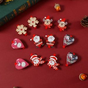 6-piece set of festive Christmas wooden clips featuring Santa, snowman, and reindeer shapes