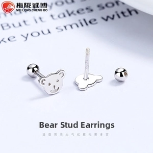 Detailed view of S925 sterling silver bear stud earrings with secure screw-back closures