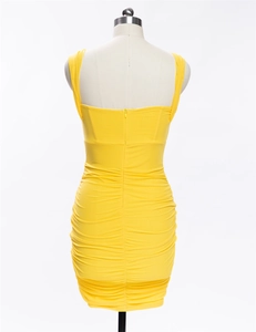 Detailed back view of a yellow bodycon dress with ruched fabric and hidden zipper
