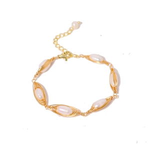 Handcrafted natural pearl wire-wrapped bracelet with gold finish and adjustable chain