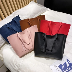 Women's litchi pattern leather tote bag with tassels in multiple colors for shopping