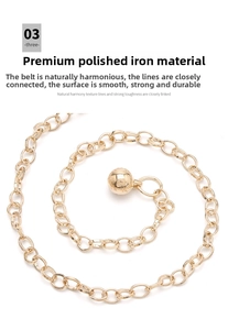 Detail of gold metal waist chain with round links and a polished golden sphere pendant