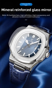 Detail of 9H mineral glass watch face showing scratch-resistant crystal and date window