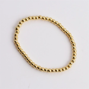 Polished 18k gold-plated beaded elastic bracelet with mirror finish for women