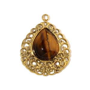 Detailed close-up of water drop tiger eye stone pendant with golden hollow floral frame