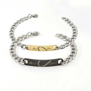 Bracelets couple en acier inoxydable avec puzzle de cœur et gravure Real Love bicolore