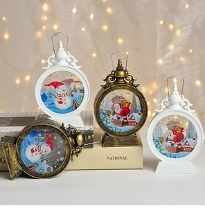 Close-up of vintage Christmas lanterns with Santa and Snowman illustrations on books
