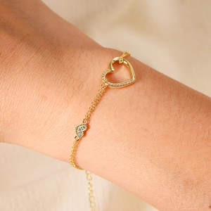 Double-layered S925 silver heart bracelet with sparkling zircons in a gold finish