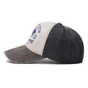 Vintage washed baseball cap with distressed brim and American football graphic print