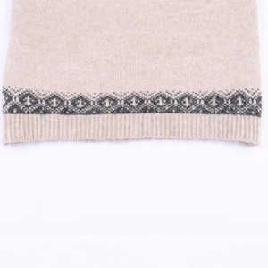 Short sleeve knit sweater with beige geometric jacquard pattern and ribbed hem detail