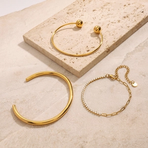 Set di bracciali rigidi dorati in acciaio inossidabile e catena con zirconi su pietra