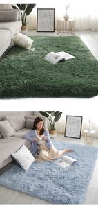 Detail view showing thick high-density dark green and lake blue plush rugs in a modern room