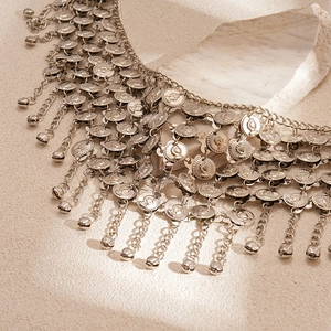 Multi-layer silver metal waist chain with geometric coins and bell tassels