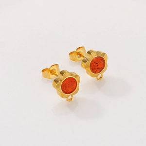 Golden flower titanium steel earrings with orange zircon and pendant loop on white base