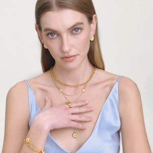 Parure de bijoux marguerite en or 18 carats avec collier, bague, boucles et bracelet