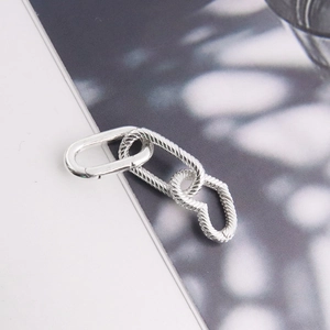 Detailed view of S925 sterling silver spring clasp with textured oval links for jewelry