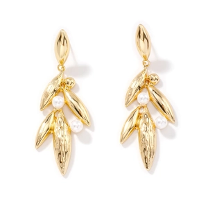 Elegant gold leaf earrings with white round pearls in a minimalist nature-inspired design