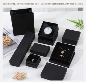 Multiple sizes of black kraft paper jewelry gift boxes and matching paper bags set
