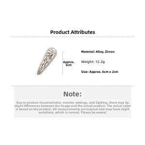Detailed view of cubic zirconia alloy hair clip with dimensions 6cm by 2cm and weight 12.2g