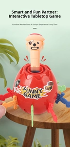 Close-up of pirate barrel toy on wooden table with colorful swords for interactive game