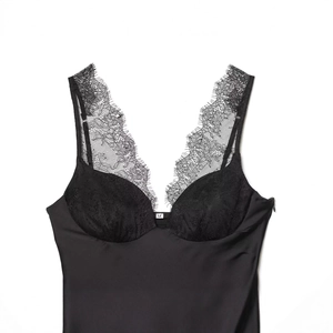 Elegant black satin camisole with lace trim for women, minimalist silk texture sleeveless top