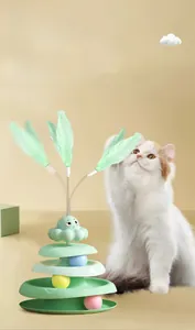Detail view of a 3-layer cat track turntable toy with colorful balls and spring feather