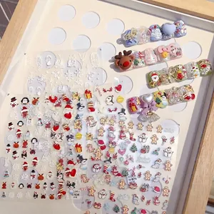 3D Christmas embossed nail stickers featuring gingerbread man, reindeer, and snowman