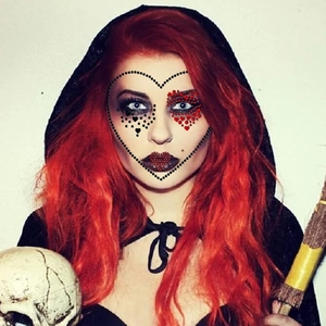 Halloween 3D face gems with red and black crystals for gothic makeup look