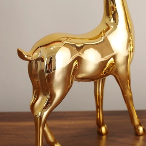 Golden luxury elk statue with mirror finish plating for modern home decor styling