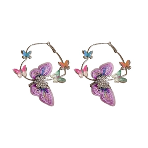 Silver needle hoop earrings with purple embroidery butterfly and sparkling rhinestones