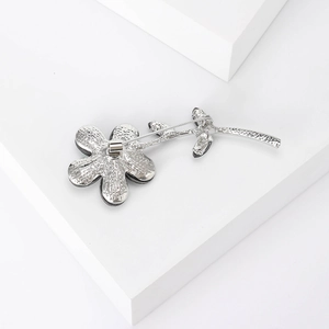 Retro silver flower brooch with abalone shell showing detailed back pin construction