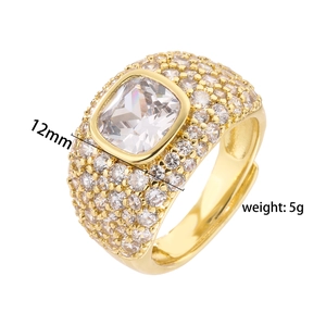 Macro shot of 18K gold ring with a 12mm rectangular cubic zirconia and paved accents