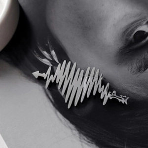 Silver heartbeat waveform heart brooch with arrow detail for suits and sweaters